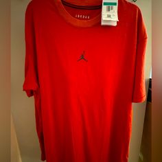 Nwt- Xl Men’s Red Nike Jordan T-Shirt Nike University Red Crew Neck T-shirt, Nike Casual T-shirt In University Red, Nike Red Graphic Tee Top, Nike Red Graphic Tee, Nike Red Tops For Streetwear, Red Nike Tops For Streetwear, Nike Jordan T Shirt, Jordan T Shirt, Red Nike