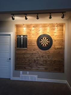 a dart board mounted to the side of a wall