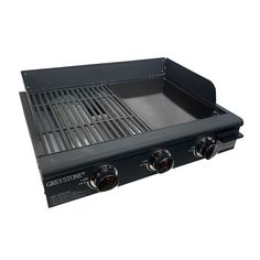 an outdoor grill with two burners on top