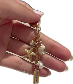 Beachy Gold Jewelry With Starfish Charm, Gold Jewelry With Starfish Charm For Beach, Beach Dangle Charms Jewelry, Gold Beach Jewelry With Starfish Charm, Gold Starfish Charm Jewelry For Beach, Gold Jewelry With Star Charm For Vacation, Gold Star Charm Jewelry For Vacation, Beach Dangle Jewelry With Star Charm, Mystical Mermaid