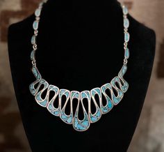 Gorgeous Taxco 925 sterling silver turquoise inlay Mexican bib necklace  Measures: 17 inches long by 1 1/2 inches at its widest point and weighs 60 grams  Marked: Taxco Mexico AMC and the TAXCO Sterling Silver registration number absolutely beautiful!! Unique Blue Necklace With Inlay, Southwestern Silver Necklaces With Inlay, Unique Silver Turquoise Necklace With Inlay, Elegant Turquoise Necklace With Inlay, Elegant Turquoise Inlay Necklace, Southwestern Silver Turquoise Inlay Necklace, Unique Blue Turquoise Inlay Necklace, Collectible Blue Inlay Necklace, Southwestern Blue Necklace With Inlay