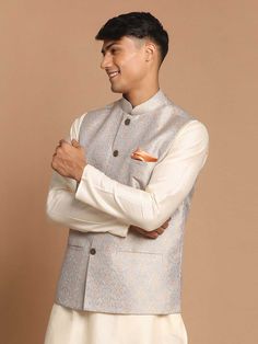 VASTRAMAY Men's Grey Silk Blend Woven Nehru Jacket A sophisticated take on the classic Nehru jacket, this VASTRAMAY piece is crafted from a luxurious silk blend fabric for a touch of elegance. Key Features: Material: Silk Blend Color: Grey Style: Nehru Jacket Woven design Button closure Multiple pockets Specifications: Brand: VASTRAMAY Size Options: S, M, L, XL, XXL Fit: Regular Occasion: Casual, Festive, Party Care Instructions: Dry clean only Material & Care: The jacket is made of a luxurious Silk Long Sleeve Nehru Jacket, Classic Nehru Jacket For Festive Semi-formal Occasions, Classic Long Sleeve Nehru Jacket For Festive Occasion, Classic Nehru Jacket With Stand Collar For Festive Occasions, Festive Classic Nehru Jacket With Stand Collar, Traditional Silk Outerwear For Formal Occasions, Traditional Silk Formal Outerwear, Semi-formal Classic Nehru Jacket With Stand Collar, Festive Tailored Nehru Jacket For Business