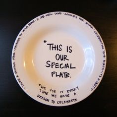 a white plate with writing on it that says, this is our special plate we use it every time we have a reason to celebrate