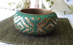 "Lovely green bangle from the past. Handwoven brass and fiber (possibly bamboo, straw, hemp) perfect for boho and hippie style wardrobes. The core is solid brass, the weaving has a concave profile and will certainly get compliments. Wide at 1.5\" across.  In very good to excellent vintage condition. Wonderful patina to the brass. If you have any questions about this piece, please feel free to contact me. Please check out all the other vintage, new and OOAK jewelry in my shop. Thank you for stopping by!" Handmade Green Brass Bracelet, Handmade Green Brass Bracelets, Handmade Brass Bracelets In Green, Bohemian Natural Bangle Bracelets, Handmade Green Bangle For Festivals, Handmade Green Bangle For Festival, Bohemian Natural Color Bangle Bracelets, Bohemian Natural Color Bangle Bracelet, Green Woven Bracelet Jewelry