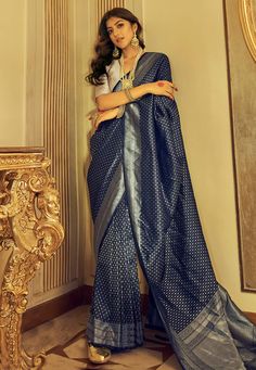 Kanjivaram silk Saree in Navy blue colour 10053 Desc: SareeStyle : Kanjivaram Sarees Saree Color : Navy Blue Fabric : Kanjivaram Silk Work : Resham Wash Care : Dry clean Sleeve Style : Half Sleeve Long Sleeves : Done only in Custom Stitch Sleeves Lining : Done only in Custom Stitch Bust Size : 32 to 42 Inches Occasion : Festival Diwali Eid Durga Pooja Ganesh Charturthi Dussehra. With Express Free Shipping Buy Indian Party wedding wear Bridal Sarees Kanjivaram silk Saree in Navy blue colour 10053 Navy Blue Saree, Durga Pooja, Blue Silk Saree, Kanjivaram Sarees Silk, Navy Blue Colour, Indian Party, Kanjivaram Silk Saree, Satin Saree, Wedding Saree Indian