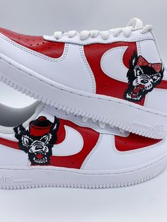 These hand painted NCSU are great for game days, college decisions, or just a gift for your graduating senior! All custom AF1's are painted with high quality leather paint and sealed with a top coat. Each shoe may slightly vary in color and design, but is hand painted with lots of care and detail! (All custom college themed shoes are fully customizable- I can do any school and a range of designs from simple to intricate! Just tell me what you want!) Shoe sizes are posted as men's sizes but can t Custom Red Sneakers With Artwork, Custom Red Sneakers With Custom Artwork, Red Custom Sneakers With Custom Artwork, Red Custom Sneakers With Artwork, Hand Painted Red Custom Sneakers For Streetwear, Custom Hand Painted Red Sneakers, Custom Red Hand Painted Sneakers, Custom Red Hand Painted Sneakers For Streetwear, Red Hand Painted Custom Sneakers For Streetwear