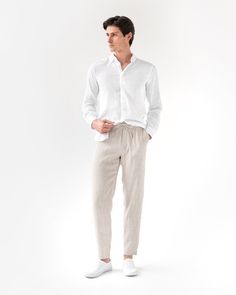 Men's linen pants available in various colors. Featuring an elastic drawstring waist and two side pockets, these linen trousers are comfortable and versatile. The tapered fit makes them look elegant when worn loose or rolled up. Lightweight and breathable, they are perfect for hot summer days and pair well with linen shirts and blazers. Discover more colors of the PALERMO pants! Please note that due to the many variations in monitors and browsers, actual colors may vary. Classic Linen Pants With Elastic Waistband, Linen Pants Outfit Men, Beige Linen Pants Outfit, Mens White Trousers, White Outfit For Men, Beige Linen Pants, Mens Summer Pants, Mens Wardrobe Essentials, White Summer Shirt