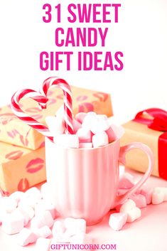 candy canes and marshmallows in a mug with the words 31 sweet candy gift ideas