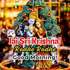 an idol sitting on top of a table next to a sign that says, jai sririshna radie rade and good morning