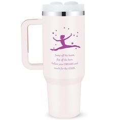 a white travel mug with a pink lid and purple lettering on the side that says, happy all the time