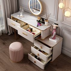 a vanity with two drawers and a mirror on the wall next to a stool in front of it