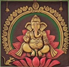 an elephant statue sitting on top of a flower in front of a green and red background