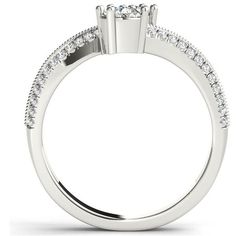 a white gold engagement ring with three stones on the side and two rows of diamonds at the top