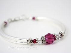 ------------- Swarovski 10mm Fuchsia Crystal hugged by antiqued sterling silver beadcaps Double silver-plated curved tubes Swarovski crystals  Antiqued silver plated bead spacers Silver plated lobster clasps, rings, wire protectors Beading Wire Length is approximately 7.25 inches, but can be customized Packaged in elegant bracelet box ready for gift giving.. Check out my other bracelets https://www.etsy.com/shop/PearlTwinkle?section_id=14773209&ref=shopsection_leftnav_3Comes in elegant jewelry b Pink Jewelry For Anniversary Gift, Pink Bracelets For Valentine's Day Gift For Mom, Pink Bracelets For Mom On Valentine's Day, Pink Bracelets For Mom For Valentine's Day, Pink Bracelets For Mom, Valentine's Day Gift, Elegant Pink Bracelet For Birthday Gift, Pink Bracelet For Mom, Valentine's Day Gift, Pink Birthstone Bracelet As Gift, Pink Birthstone Bracelet For Gift