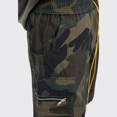 These camouflage cargo shorts allow for maximum mobility and breathability, thanks to their loose and relaxed design. With a stylish streetwear and high street pattern, this multi-pocket cargo short can help you dress to impress. Stand out in the crowd and show off your style. 60% cotton, 37% polyester, and 3% elastane Distressed Yellow drawstring closure Camouflage patten Elastic waist, drawcord, loose fit for comfort. Made from breathable, soft-washed material. Perfect for casual streetwear Si Khaki Techwear Shorts For Streetwear, Combat Style Summer Cargo Pants With Pockets, Combat Style Cargo Pants With Pockets For Summer, Khaki Short Cargo Pants For Streetwear, Short Khaki Cargo Pants For Streetwear, Green Cargo Shorts With Multiple Pockets For Streetwear, Urban Cargo Style Shorts For Streetwear, Khaki Shorts With Side Pockets For Streetwear, Combat Style Khaki Shorts With Pockets