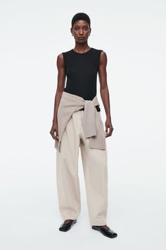 Barrel-Leg Cotton Trousers Winter 2024 Fashion Trends, Barrel Pants, Winter 2024 Fashion, Belted Cape, 2024 Fashion Trends, Denim Sweater, Cotton Trousers, Clothes Crafts, 2024 Fashion