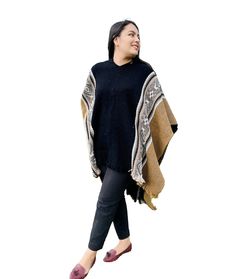 Tierra Nueva Wool Hooded Poncho This creation has been made by incredible artisans in Otavalo city - Ecuador. You wont feel any cold at all thanks to its thick fibers.  Versatile piece of art if you are looking a garment for camping wear , hiking or just to form a movement with your friends on a special occasion. - Traditional Fashion - Unisex  - One Size Only - 100% Wool cape poncho - Warm , soft and light - High quality materials - Created and manufactured in Ecuador - Perfect for gift Measurements: Width : 42.12" ( 107cm) Length: 31.49" (80cm) Fringe: 2" ( 5cm) Free Shipping in USA Note: All of our products are made by hand, so dimensions may vary slightly. Chat with us  if you have any questions about our products Cozy Long Sleeve Poncho One Size, Hooded Man, Camping Wear, Cozy Alpaca Poncho Cape, Multicolor One-size Poncho For Outdoor, Brown Alpaca Poncho Cape, Poncho Men, Cozy One-size Poncho With Batwing Sleeves, Hooded Poncho