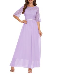 a woman wearing a long purple dress with lace detailing on the sleeves and waistline