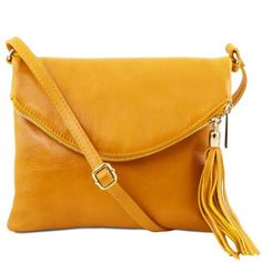 Italian Leather shoulder bags TL Young bag Shoulder bag with tassel detail Yellow TL141153. Soft structure, 2 compartments, Soft full grain leather Yellow Discover how to customize your bag and make it unique. Shop online and save money. 30-Day Money-Back Guarantee! Foldover Crossbody Bag, Bag With Tassel, Contemporary Accessories, Leather Hobo Bag, Navy Leather, Leather Hobo, Golden Yellow, Leather Care, Hobo Bag