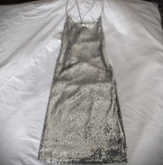 "(IMPORTANT! Please check the measurements posted below and compare same with your own clothes before buying Quite a find! Good quality! This is a stunning gorgeous party/Holiday dress for XS ladies. Full silver sequins with gray lining and an adjustable criss-cross tie at back for personal comfort. In very good condition, hardly worn!! Good vintage value (measured flat) Size XS Length top to bottom 29\" Length neckline to bottom 28\" Length back waist/hip area top to bottom 15\" Width back wais Area Top, Bride Dress Vintage, 80s Prom Dress, Burgundy Jacket, Mod 60s, White Stripes Shirt, Sequin Party, Mini Cami Dress, Hollywood Glam