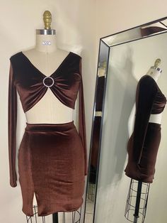 Brown two piece stretch velvet set Long sleeve crop top with rhinestone ring for the perfect cleavage Mini skirt with a side slit fits the body like a glove MADE TO ORDER Final Sale. No returns. No exchanges. No store credit. Brown Two Piece, Dance Crop Tops, Velvet Set, Velvet Mini Skirt, Winter Skirt, Rhinestone Ring, Stretch Velvet, Long Sleeve Crop, Outfits Casual