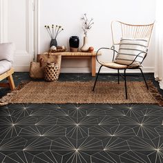 a living room with black flooring and white walls