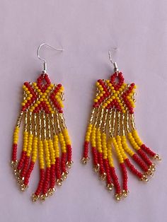 These earrings were handcrafted by an Indigenous artist from the highlands of Guatemala.  The glass seed beads are top quality glass. The earrings are approximately 3.5 inches long. Traditional Yellow Handwoven Beaded Earrings, Handwoven Yellow Beaded Earrings With Round Beads, Traditional Yellow Beaded Earrings With Tiny Beads, Yellow Handwoven Beaded Earrings With Round Beads, Traditional Yellow Beaded Earrings, Aztec Earrings, Native Beading, Earring Designs, Origami Crafts Diy