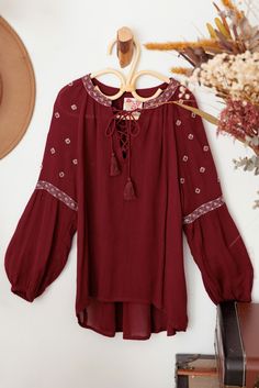 ♡ Look effortlessly stylish in our Ethnic Boho Embroidered Front Tie Girls Top. With its unique embroidered detailing and trendy front tie, this top will elevate your outfit to the next level. Designed for comfort with long sleeves, it's perfect for any occasion. Embrace your boho side and stand out from the crowd! ♡ Item Feature: ethnic boho, embroidered, front tie, long sleeve, light weight, beaded, festival, chic, stylish. V-neck Top With Geometric Embroidery For Fall, Folk Style Tops For Fall Festival, Bohemian Blouse With Embroidered Neckline For Fall, Bohemian Peasant Top With Embroidered Sleeves For Fall, Casual Tops With Embroidered Sleeves For Festival, Bohemian V-neck Top With Embroidered Sleeves, Fall Bohemian Blouse With Embroidered Neckline, Casual Festival Tops With Embroidered Sleeves, Casual Festival Top With Embroidered Sleeves