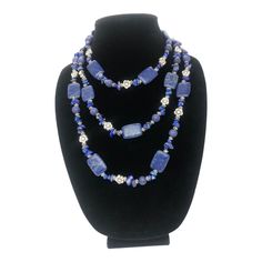 This stunning 33-inch necklace exudes charm and elegance with its abundance of Lapis Lazuli and intricate silver floral designs. You can wrap it around your neck twice or thrice to make a bold statement wherever you go. Lapis Lazuli is a powerful stone known for its ability to enhance thinking and spirituality, and its high vibration can be felt when you hold the necklace or wear it. The stone is believed to increase self-knowledge and awareness of one's thoughts, helping you to trust your inner Unusual Necklace, Boho Chic Jewelry, Lapis Lazuli Stone, Floral Necklace, Nature Jewelry, Boho Necklace, Floral Designs, Statement Jewelry, Lapis Lazuli