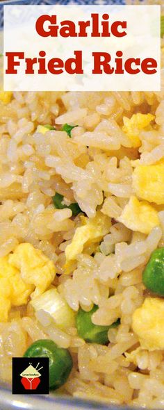 a close up of rice with peas and eggs