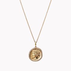 This mythology-inspired necklace features one of ĀZLEE’s signature coin pendants, handcrafted in 18K yellow gold. Pavé diamonds surround the goddess Arethusa, nymph of the sea, whose image represents strength and beauty. Add this large textural charm necklace to your stack to make a bold, beautiful statement. Each of ĀZLEE’s charms feature a clasp that opens and closes, allowing you to add on to or remove from any chain. Gold Goddess Style Jewelry With Coin Pendant, Goddess Gold Necklace With Coin Pendant, Spiritual Gold-plated Coin Necklace, Gold Engraved Goddess Necklaces, Gold Goddess Pendant Necklace, Inspired Necklace, The Goddess, Coin Necklace, Coin Pendant