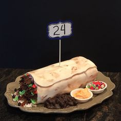 a large piece of cake sitting on top of a plate