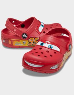 Crocs X Disney Pixar Cars Lightning Mcqueen Clogs. Ka-Chow! Go Faster Than Fast And Quicker Than Quick With Our Lightning Mcqueen Clog. Each Pair Features Cars Graphics And Long-Lasting Leds That Light Up With Every Step So You Can Speed Off In Style. Pivoting Heel Straps That Let You Choose Between Clog And Slide Styles. Uppers Featuring Graphics And Lights Where You Can Interact With Them. Croslite™ Foam Outsoles For Better Traction, Support And Comfort. Long-Lasting Led Lights; Batteries Are Ka Chow, Lighting Mcqueen, Waterproof Slippers, Cars Lightning Mcqueen, Toddler Car, Kids Clogs, Mc Queen, Crocs Crocband, Light Up Shoes