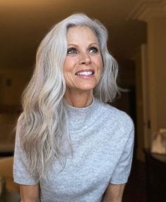 Long gray hair is a thing of beauty, and these inspirational photos prove that it's gorgeous at any age! In this post, I show off a variety of long gray hairstyles for women of all ages and teach you how to take care of your long grey hair as well. Don't let that old rule about no long hair after 40 get you down - rules are made to be broken! And if you think you're too young to wear gray hair? Think again - these beautiful ladies will show you how long silver hair works for everyone! Long Hair Older Women, Carmen Dell'orefice, Silver White Hair, Growing Your Hair Out, Grey White Hair, Grey Hair Styles For Women