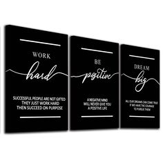 three black and white canvases with the words work hard, be positive on them