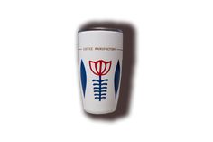 a white coffee cup with blue and red designs on the side, against a white background