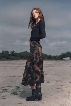 This tulip shaped midi skirt is made with 12 panels and a wide high waisted waist band. It has beautiful flow and movement and feels super soft and comfortable. Part of our tie-dye collection, it is a great piece for all seasons but especially for fall as it will give you serious witchy vibes. Made with our super soft buttery bamboo stretch jersey. Bohemian Midi Skirt In Rayon, Bohemian Rayon Midi Skirt, Bohemian Midi Rayon Skirt, Bohemian Fitted Midi Dress, Fall Fitted Maxi Skirt, Fitted Maxi Skirt For Fall, Bohemian Long Skirt Dress For Fall, Bohemian Long Dress For Fall, Fitted Rayon Midi Bottoms