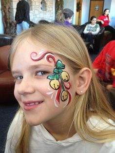 AmaDazzle Arts (Christina Kerr Davidson) || holiday bells Holiday Face Paint, Face Painting For Adults, Reindeer Face Paint, Face Painting Tips, Painting For Adults, Christmas Face Painting, Cheek Art, Face Paints, Face Painting Easy