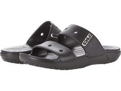 Crocs Classic Sandal - Shoes : Black : Versatile, customizable, and guaranteed to offer you all day comfort, The Crocs Classic Sandal is lightweight, fun to wear and offers holes for Jibbitz charms! Slip right into your new favorite seasonal must-haves! Original Croslite foam cushion will keep you comfortable and supported no matter your daily activity. Iconic Crocs Comfort offers lightweight and flexible 360-degree comfort. Easily cleanable and quick dry. Perforated design is customizable with Crocs Slides, Black Crocs, Classic Sandals, Crocs Sandals, Two Strap Sandals, Cute Country Outfits, Daily Activity, Sandal Shoes, Sandals For Women