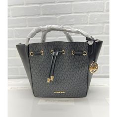 100% Guaranteed Authentic Michael Kors !! **Firm On Price ** Details : Bucket Bag Logo-Print Canvas Gold-Tone Hardware Dimensions : 12”W X 10.5”H X 6”D Approx Handle Drop: 5.25 Adjustable Measurement: 18.5”-21” Interior Details: Back Pocket Lining: 100% Polyester Drawstring Fastening Imported Color : Black/Brown Size : Large Msrp : (Not Specified) **Comes From Smoke & Pet Free Environment ** #Mk #Michael Kors #Wallet #Wristlet #Designerbag #Leather #Newcollection #Gift #Kashcloset #Collection #G Black Bucket Bag With Branded Hardware For Daily Use, Black Bucket Bag With Branded Hardware And Top Handle, Black Bucket Bag With Branded Hardware, Modern Black Bucket Bag With Branded Hardware, Black Bucket Bag With Top Handle And Branded Hardware, Black Bucket Bag With Branded Hardware For Shopping, Designer Black Bucket Bag For Errands, Black Bucket Bag With Branded Hardware For Travel, Black Travel Bucket Bag With Branded Hardware