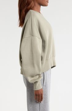 An embroidered Swoosh adds minimal branding to this cozy fleece sweatshirt cut for a relaxed, oversized fit that's enhanced by the dropped shoulders. 22" length (size Medium) Crewneck 80% cotton, 20% polyester Machine wash, tumble dry Imported Comfortable Crew Sweatshirt With Ribbed Cuffs, Cozy Nike Sweats, Nike Relaxed Fit Athleisure Sweats, Nike Athleisure Sweats With Relaxed Fit, Comfortable Nike Sweats, Oversized Crew Neck Hoodie For Sportswear, Soft Texture Fleece Crew Neck Sweatshirt, Oversized Crew Neck Hoodie In Sportswear Style, Cozy Fleece Crew Sweatshirt