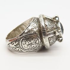 925 Sterling Silver Antique Ethnic Design Wide Massive Ring Size 9 3/4 Weight: 21.6g WELCOME TO PAWN SHOP We are an actual pawn shop and have been in business for over 25 years. Since 1990, our establishment has been serving a variety of clients by providing them with short term cash solutions and options of liquidity regarding their treasured heirlooms. Acknowledging that today′s customers are very sophisticated and are looking for a variety of investments, our acquisitions are hand-picked for Ceremonial Silver Oval Rings, Silver Oval Rings For Ceremonial Occasions, Handmade Antique Silver Engraved Ring, Antique Silver Engraved Ring, Antique Carved Sterling Silver Rings, Antique Handmade Rings In Antique Silver, Antique Handmade Silver Rings, Ornate Silver Rings For Ceremonial Occasions, Ceremonial Silver Carved Engraved Ring