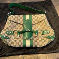 Authentic Vintage Gucci Shoulder Bag. Great Condition. Comes With Original Dustbag. Horsebit And Chain Detailing. Leather And Canvas. Clean Interior With Zipper Pocket. Entrupy Certificate Of Authentication Included. Gucci Horsebit, Leather And Canvas, Gucci Shoulder Bag, Gucci Bags, Vintage Gucci, Gucci Bag, Zipper Pocket, Dust Bag, Bag Lady