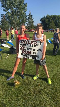 two young people holding up a sign that says, maybe it's ok to run