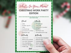 someone holding up a christmas work party checklist