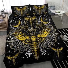 a bed with yellow and black designs on it