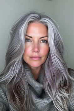 Silver hair is not just a color—it's a testament to boldness. Once the prerogative of only the most intrepid, it has now evolved into a widely adopted trend, epitomizing sophistication and modern chic. With an array from gleaming metallics to smoky charcoal, silver offers a hue for every skin tone and persona. Click to see more. Women Haircuts Long, Shampoo For Gray Hair, Grey Hair Inspiration, Beautiful Gray Hair, Silver Hair Color, Natural Gray Hair, Long Gray Hair, Women Over 50, Medium Hair Cuts