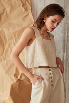 "Beige Linen Crop Top, Square Neckline Top, Cropped linen shirt, loose linen top, linen crop top, linen tank top, linen top, linen sleeveless top, linen basics, linen tops for women, soft linen, flax clothing, women linen clothing MORE: https://www.etsy.com/shop/SaikoEcoStore?ref=seller-platform-mcnav DETAILS - Cropped length - Square Neckline - Sleeveless design - 100% lightweight European linen fabric - Cut and sewn to order just for you in our studio COLOR - Beige SIZING & FIT - True to s Cropped Linen Shirt, Square Neckline Top, Linen Art, Flax Clothing, Linen Sleeveless Top, Spring Summer Capsule Wardrobe, Natural Linen Dress, Bauchfreies Top, Linen Shirts Women