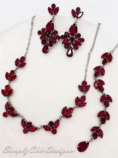 Brilliant handmade necklace, featuring all deep red crystals, finished with a beautiful long backdrop. Bracelet and earrings are also for purchase. The necklace is 16 inches long with 10 inches backdrop. The Bracelet 1 inch wide, beautiful leaf design with large teardrop Swarovski crystals. It is 6.5 inches long and has a 2-inch extension chain as in the picture. The Earrings are 2.5 inches long. Lightweight, comfortable and brilliant. Very elegant earrings will add the extravagant touch that yo Wedding Necklace Set, Bridal Earrings Drop, Bridal Earrings Pearl, Back Drop, Red Necklace, Necklace Red, Ruby Earrings, Wedding Jewellery Necklace, Cluster Earrings