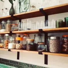 shelves filled with glass jars and other items